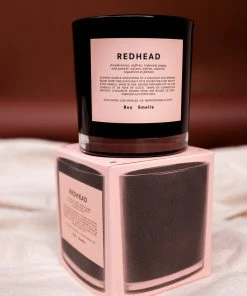 BOY SMELLS NEW IN REDHEAD CANDLE