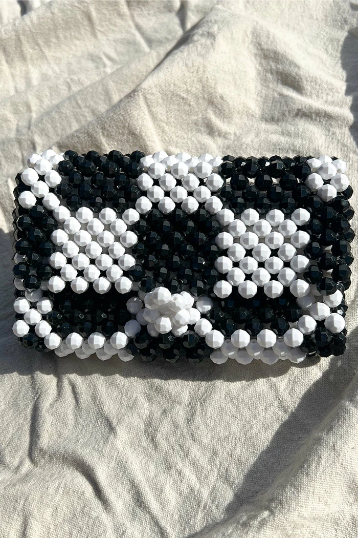 FERAL NO.9 B&W CHECK BAG SPRING '22 1 FERAL NO.9 B&W CHECK BAG SPRING '22